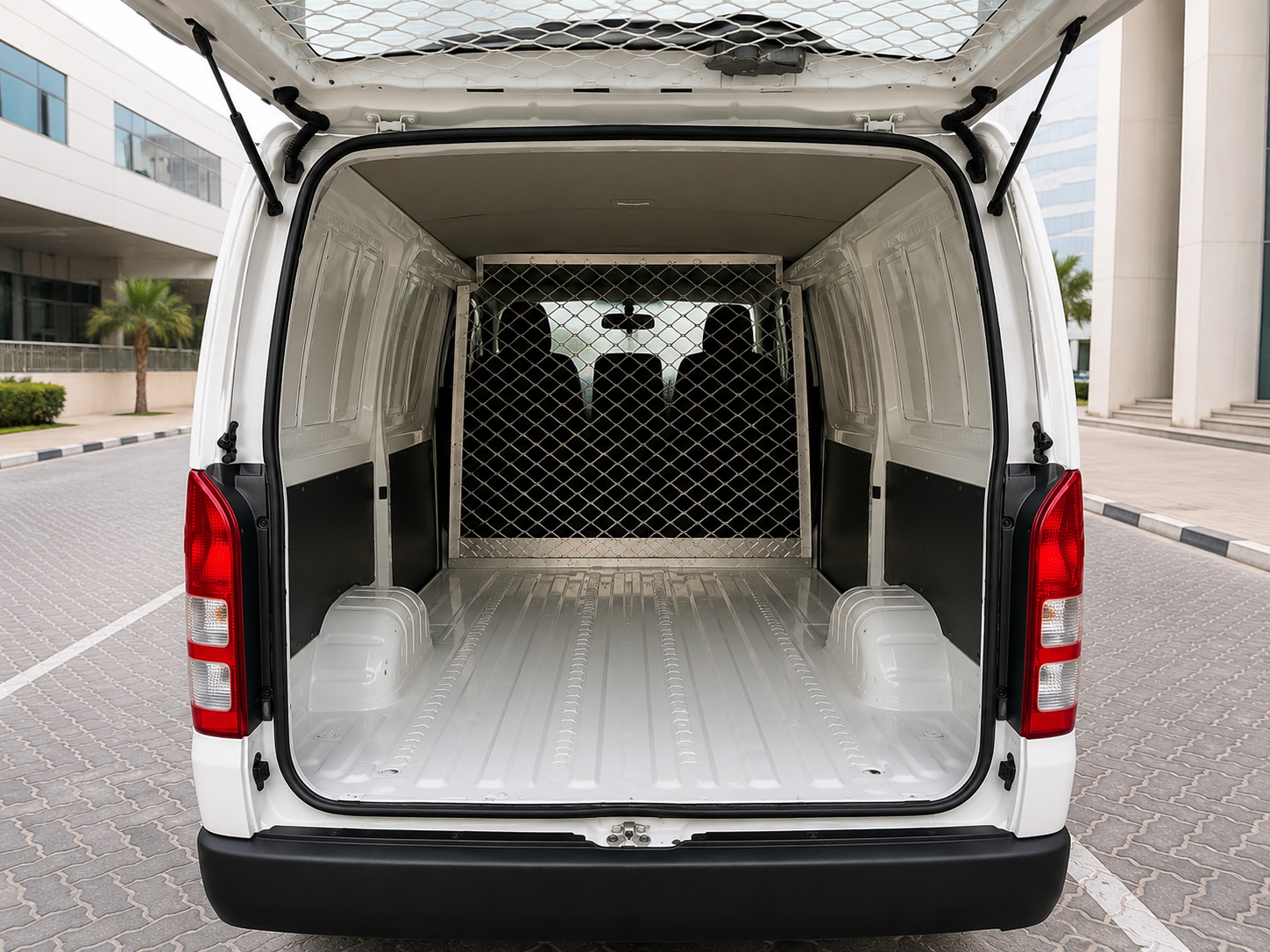 Clean van cargo loading area for hotel luggage delivery Abu Dhabi